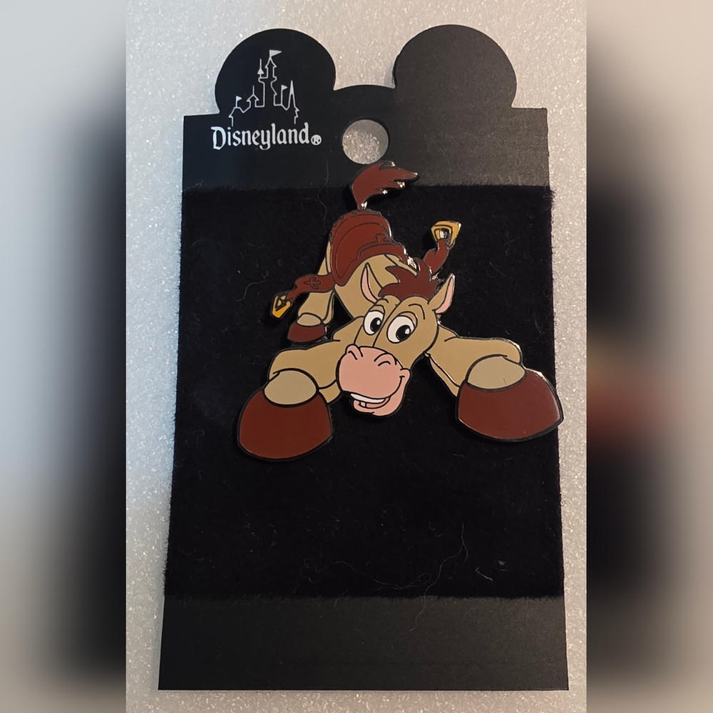 Disney Brown and Tan Bullseye Pin